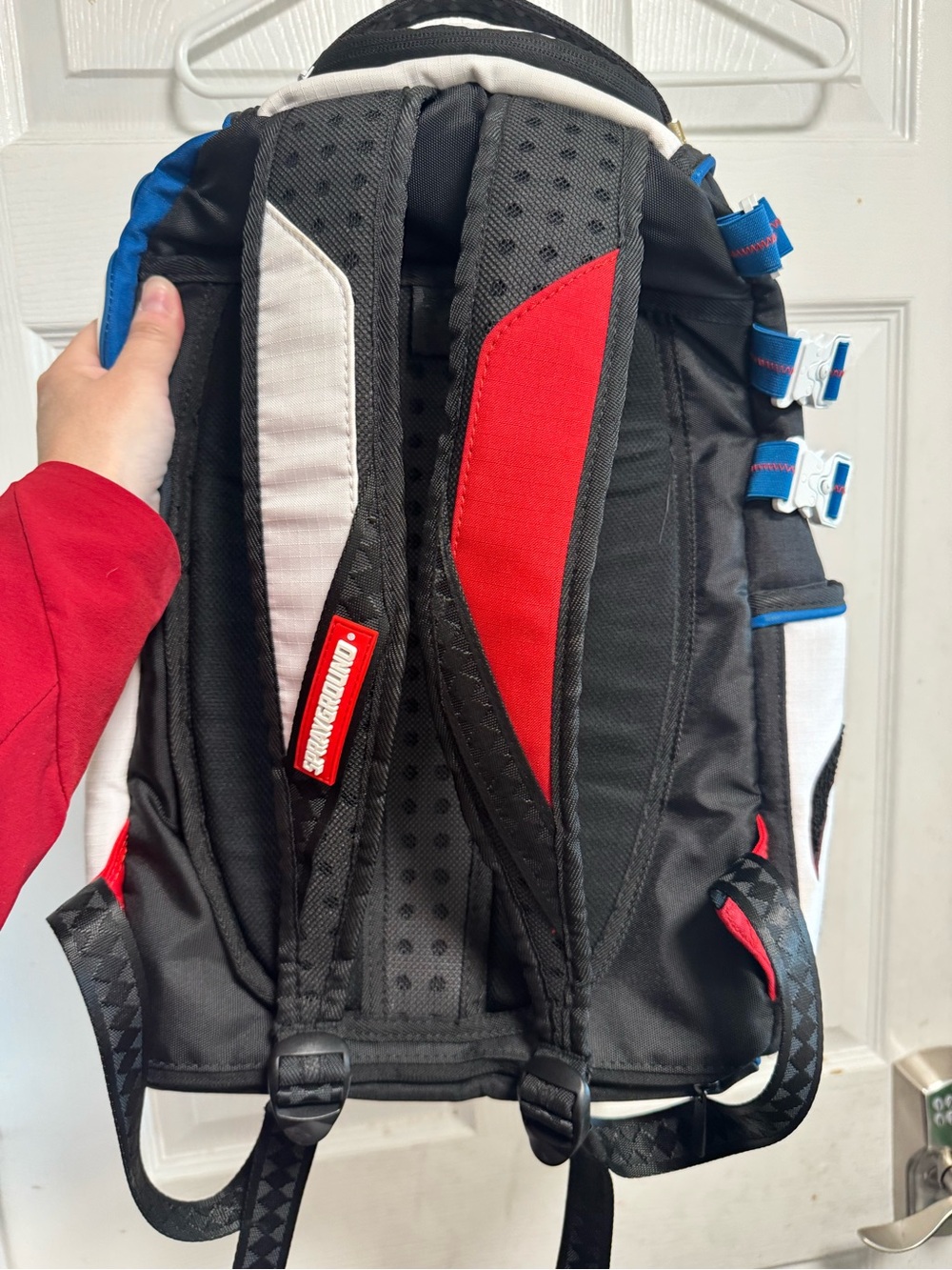 Sprayground Black, Red, White & Blue Padded Strap Backpack